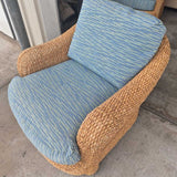 Woven Patio Swivel Chairs with Blue Cushions
