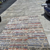 Regal Oracle Brown/Red Area Rug