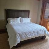 King Size Bed with Paneled Brown Headboard